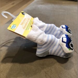 NWT - Newborn baby sock booties with blue & white stripes and blue truck decals